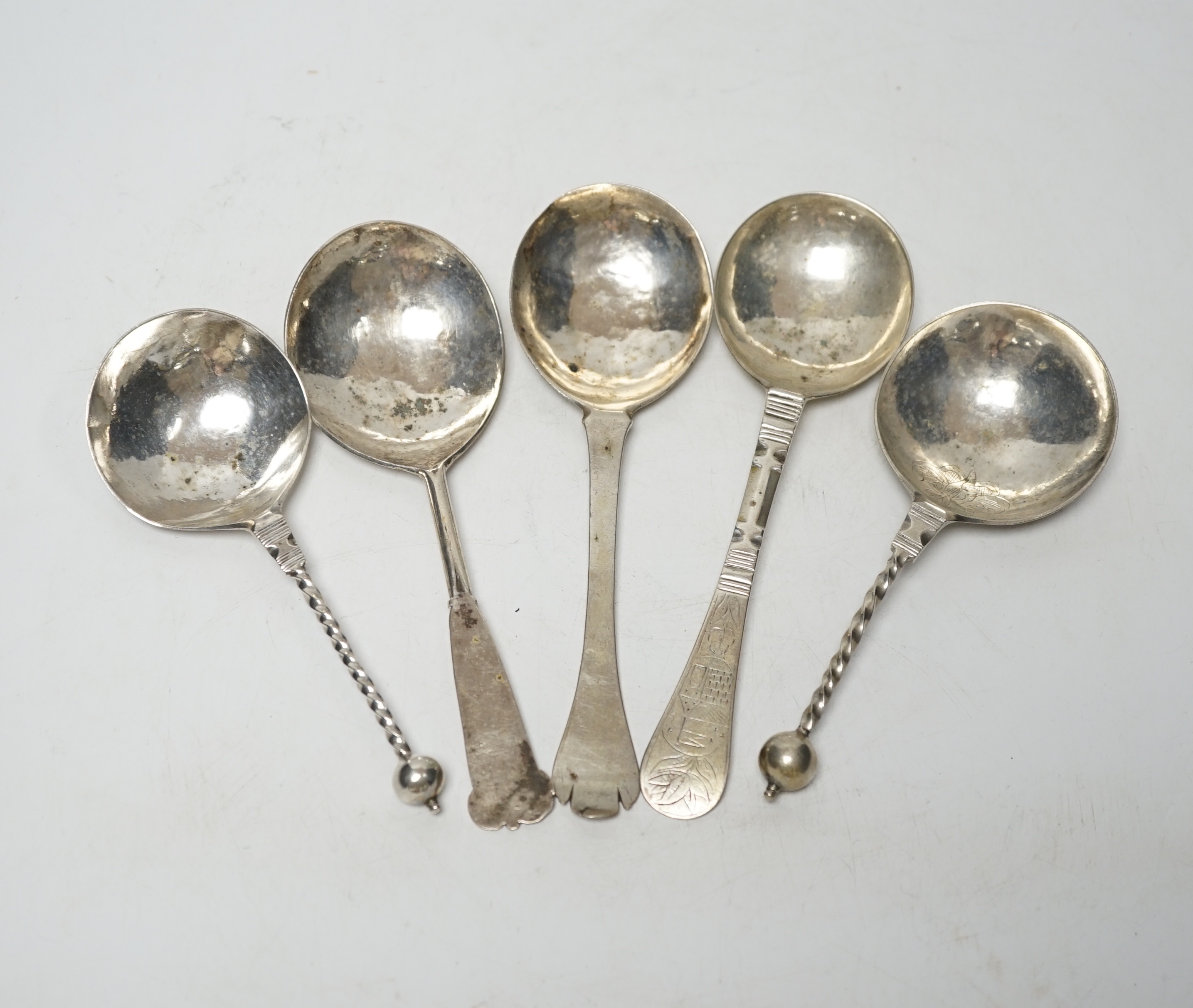 Five assorted 19th century and later Scandinavian? white metal spoons, two with maker's marks, largest 18cm.